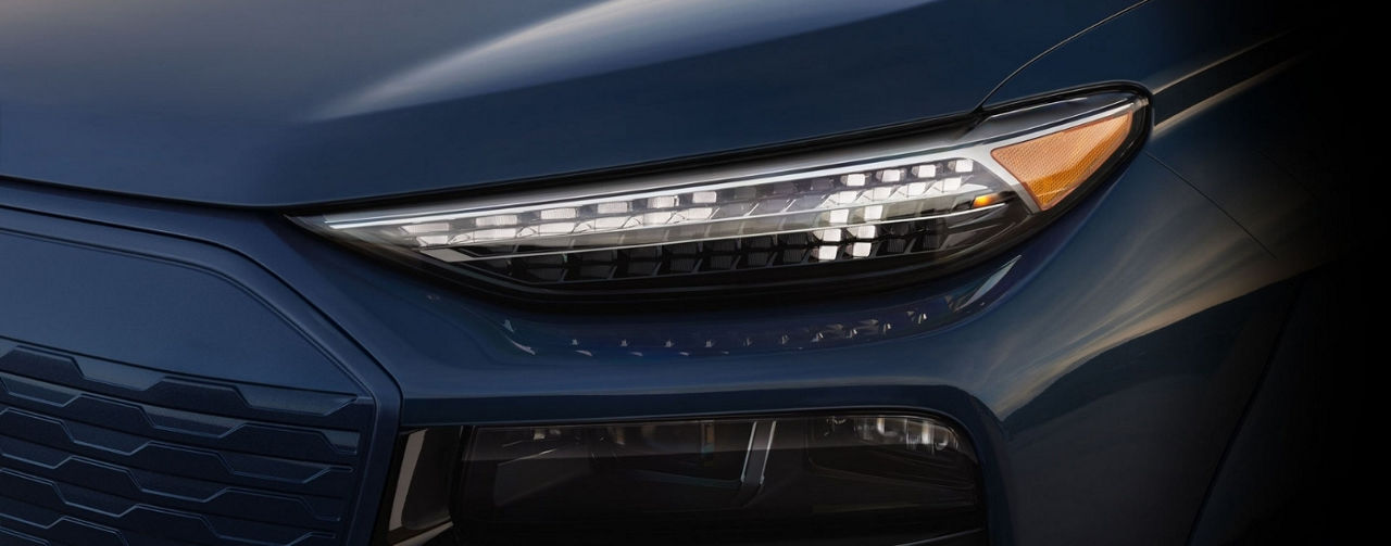Headlight on a black 2024 Audi Q6 e-tron.